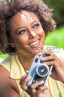 Mixed Race African American Girl Outside With Camera