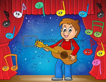 Boy guitar player on stage theme 2