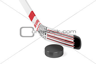 Ice hockey stick and puck 