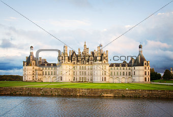 facade of Chambord chateau at sunset, France