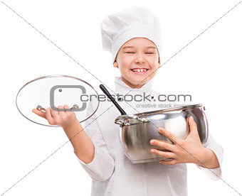 laughing little boy-cook with pan in hands