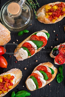 Bruschetta with tomatoes, mozzarella and basil