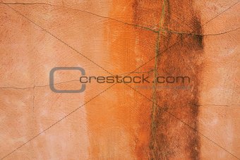 Orange cracking paint on wall