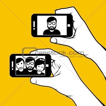 Selfie with friends - hand with smartphone