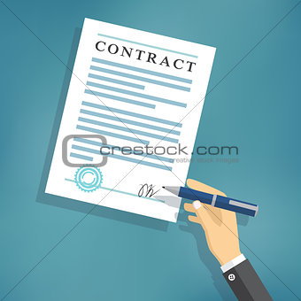Hand signing contract on white paper.