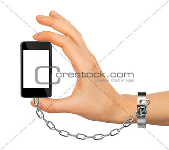 Chained female hand holding phone