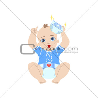 Baby In Blue Holding Fresh Nappy