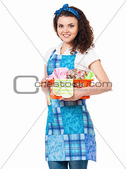 Housewife with laundry basket