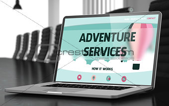 Adventure Services on Laptop in Conference Hall.