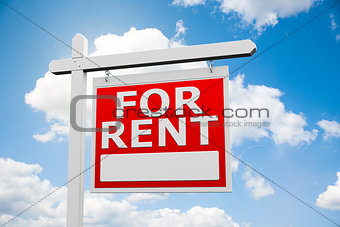 For Rent signpost on sky