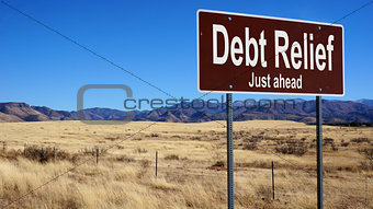 Debt Relief brown road sign