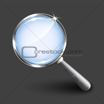 Magnifying glass on dark background.