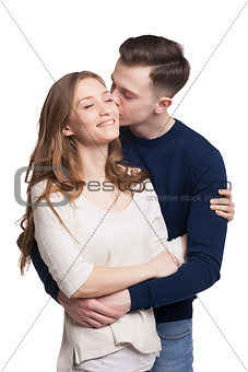 Hugging couple kissing