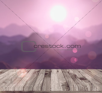 3D render of a wooden table looking to a mountain landscape