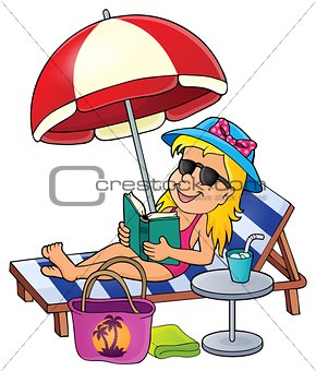 Girl on sunlounger image 1