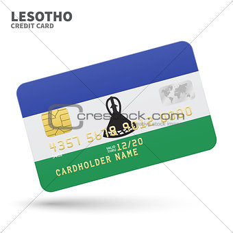 Credit card with Lesotho flag background for bank, presentations and business. Isolated on white
