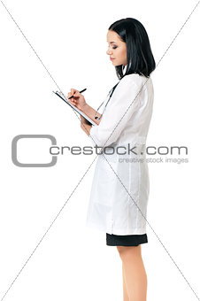 Female doctor holding clipboard