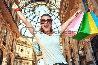 Fashion monger with shopping bags in Galleria Vittorio Emanuele