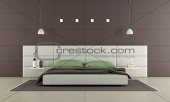 Brown bedroom with modern bed