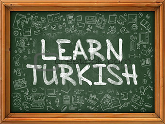 Green Chalkboard with Hand Drawn Learn Turkish.