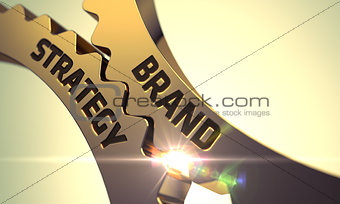 Brand Strategy on Golden Metallic Cog Gears.