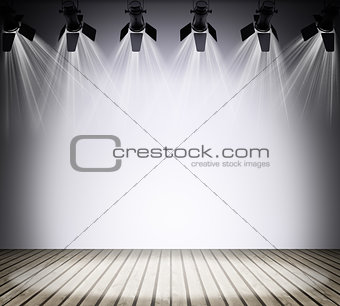 Illuminated empty concert stage with rays of light