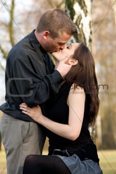 Young kissing couple