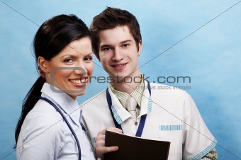 young causasian doctor with assistant