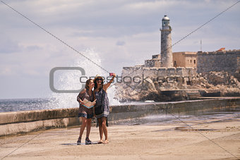 Tourist Girls Taking Selfie With Mobile Phone In Havana Cuba