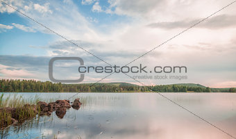 Lake with Rocks and Forest