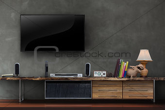 Living room led tv on concrete wall with wooden table media furn