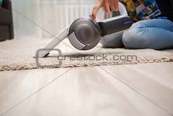 Cleaning of rug in house portable rechargeable vacuum cleaner