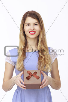 Young woman portrait holding gift
