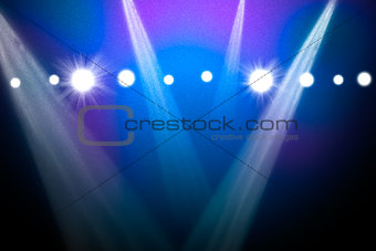 Abstract blue background with spotlights