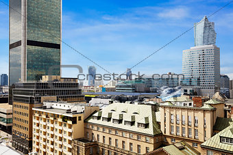 Old residences and modern office buildings at Warsaw