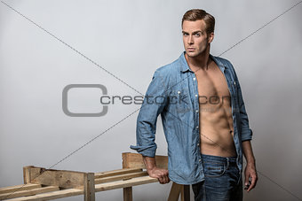 Man in unbuttoned shirt