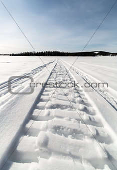 Snow Mobile Tracks on Lake