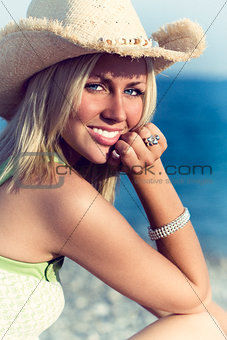 Beautiful Blonde Woman Girl in Hat on Beach