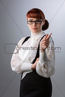 Young woman wagging finger
