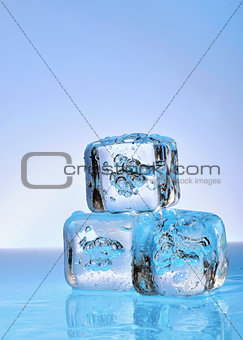 Three ice cubes on glass 