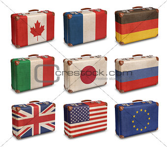 Vintage suitcases with G8 and EU flags