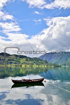 Rowboat in a fjord