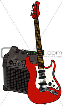 Red electric guitar and the combo