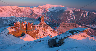 Winter Carpathian mountains; rock and a morning light