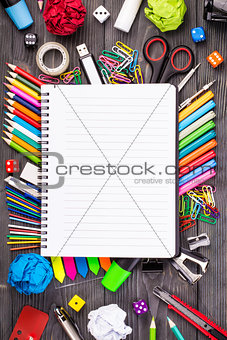 Bunch of pencils and other office supplies