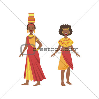 Two Women In Yellow And Red Dresses From African Native Tribe