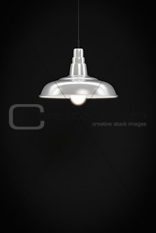 white lamp in front of a dark wall