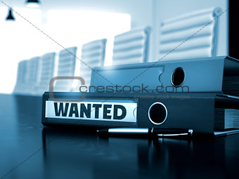 Wanted on File Folder. Blurred Image.