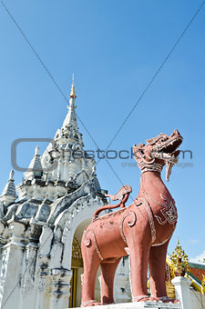 Red Lion statue at Wat Phra That Hariphunchai 