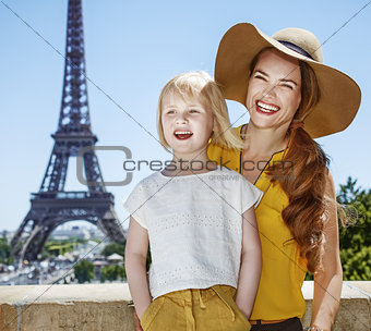 portrait of mother and daughter travellers in Paris, France